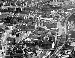 Aerial view of Island Street site; includes: E1 Chemical Building, E6 Chemical Building, E16, E17, S1 Warehouses, "Clifton Arms Block", Irongate Wharf, Pennyfoot Street, Nottingham Canal, Brewery Cut of Canal, London Road, Canal Street, c1947. [CAIS 975]