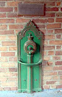 Ornate wall-mounted drinking fountain from Turney Bros Ltd leather works, Nottingham.